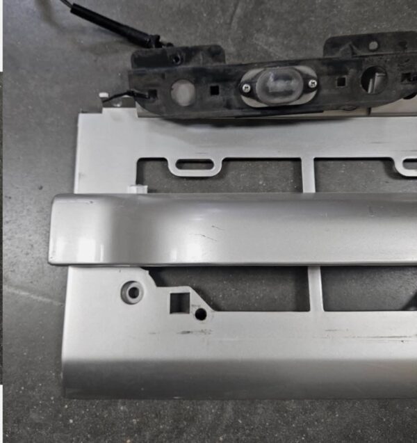 803268782_1082572551449390_6868619562908593034_n (1) Isuzu Trooper Rear Tailgate License Plate Mount Trim Panel with Light - OEM-Style Replacement