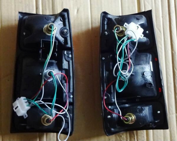 ISUZU OPEL CAMPO UTE TAIL LIGHTS PAIR LH & RH – BLACK FRAME | 1988–1991 1st Gen
